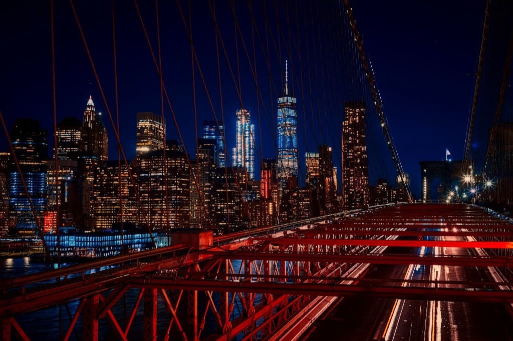 New York City skyline at night from the Brooklyn Bridge